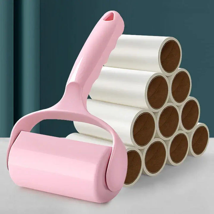 Pink washable pet hair removal roller with extra sticky rolls for cleaning furniture and clothes, ideal for dog and cat owners.