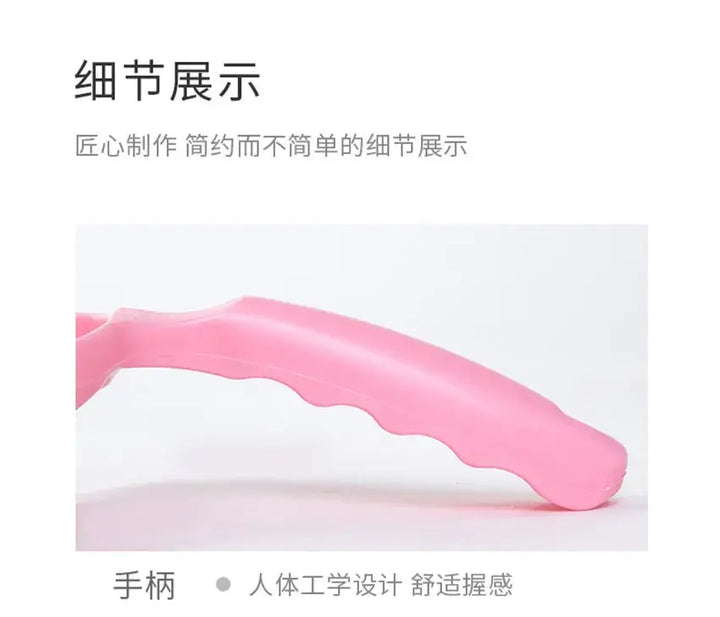 Close-up of pink ergonomic handle on pet hair roller, emphasizing design and grip for easy cleaning of pet hair from furniture.