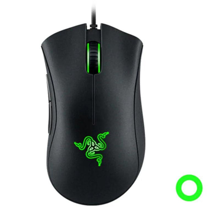 The Razer DeathAdder Essential Wired Gaming Mouse 6400DPI Optical Sensor showcases a sleek ergonomic design with a black finish, featuring a green illuminated logo and scroll wheel. It includes two side buttons and is complemented by an eye-catching green circle design.