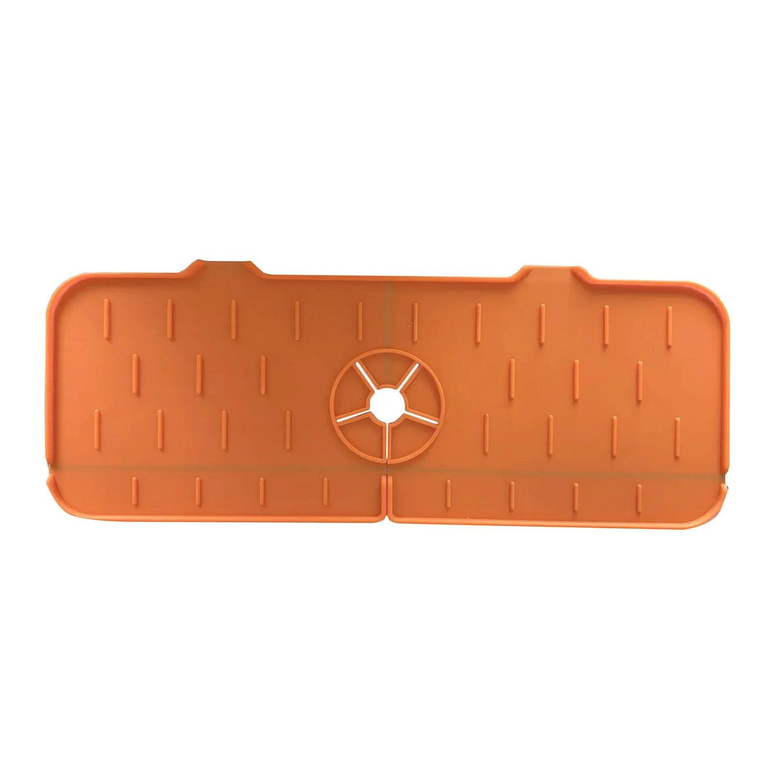 Eco-friendly orange rectangular silicone Faucet Guard Kitchen Mat with a circular hole in the center and a textured surface featuring parallel grooves, perfect for all your specialty tools needs.