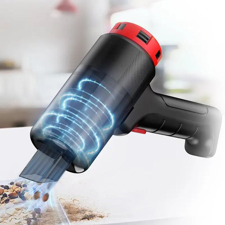 The Vehicle-Mounted Vacuum Cleaner effortlessly removes dirt and debris from surfaces. With a sleek black design accented by red features, it showcases a compact form with a transparent chamber that displays swirling particles. The blurred kitchen countertop serves as the perfect backdrop.