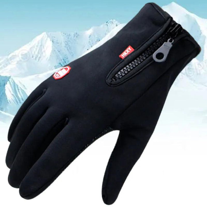 The Waterproof Winter Cycling Gloves, displayed against a snowy mountain background, are perfect for outdoor sports with their black design and convenient zipper on the back. The insulated full-finger gloves include touchscreen fingertips ideal for staying connected while biking through chilly terrains.