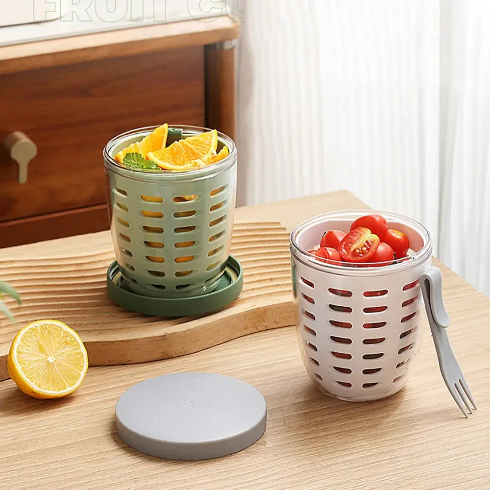 A pair of eco-friendly containers designed for spill-proof storage, ideal for holding fruits, called the "Fruit Cup with Fork Portable Picnic Bottle Large Capacity Storage Plastic Cup Sealed Leak Proof.