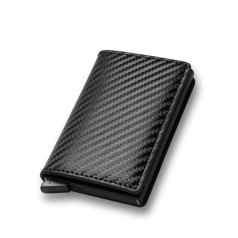 A stylish "Carbon fiber aluminum wallet" in black, featuring a textured pattern and incorporating "RFID slim card case" technology. This minimalist accessory includes an "Automatic pop-up card holder," showcased on a plain white background.