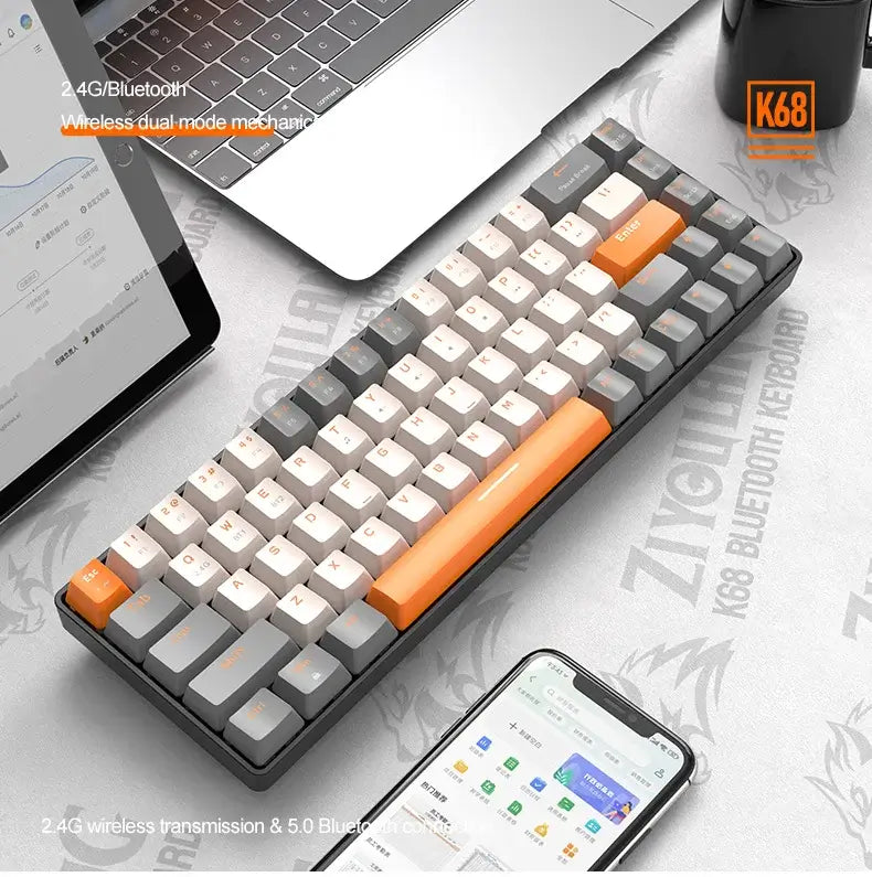 A compact and stylish mechanical keyboard, featuring an eye-catching blend of white, gray, and orange keys, rests on a desk beside a laptop and tablet. The desk mat displays the branding for the Wireless Keyboard Bluetooth Dual Mode, highlighting its seamless connectivity across multiple devices.