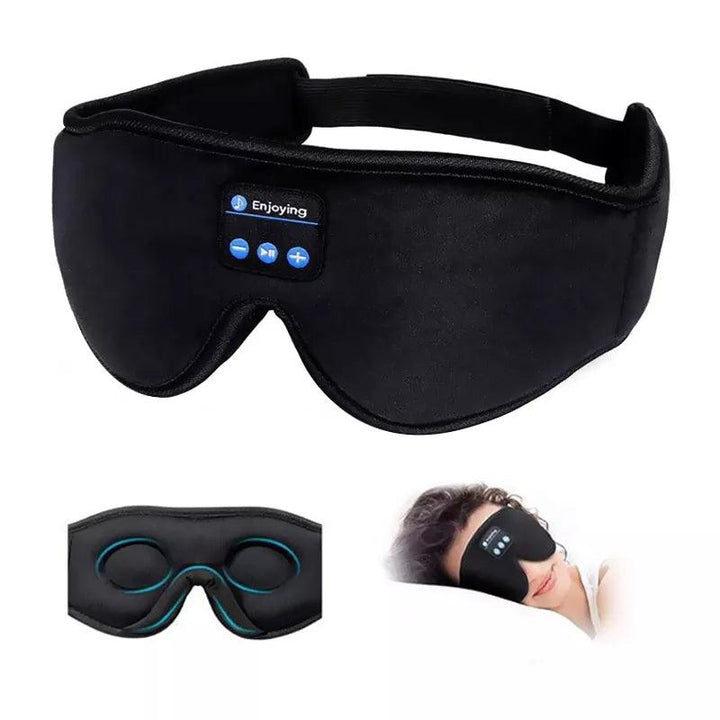 Introducing the Bluetooth Sleeping Headphones Eye Mask, a black eye mask featuring integrated Bluetooth controls and wireless music headphones. The detailed image shows the mask being worn by someone lying down, while an interior view highlights the contoured eye design, making it perfect for a restful night's sleep.