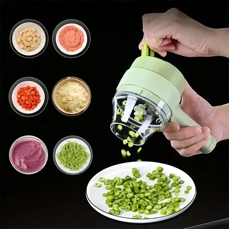 A person utilizes a green manual Vegetable Cutter, featuring an ergonomic design, to slice beans onto a plate. Nearby bowls hold sliced carrots, garlic, chilies, ginger, purple paste, and green paste against a black background.