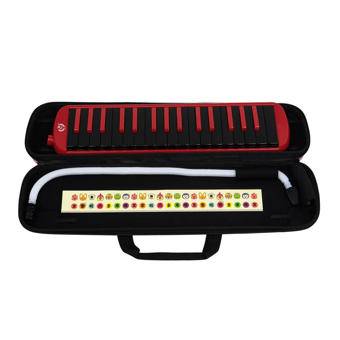 A red melodica made from ABS Resin, featuring black keys, is showcased in an open black carrying case. It comes with a white tube and the case lid is adorned with colorful animal stickers. Ideal as a beginner's musical instrument gift.