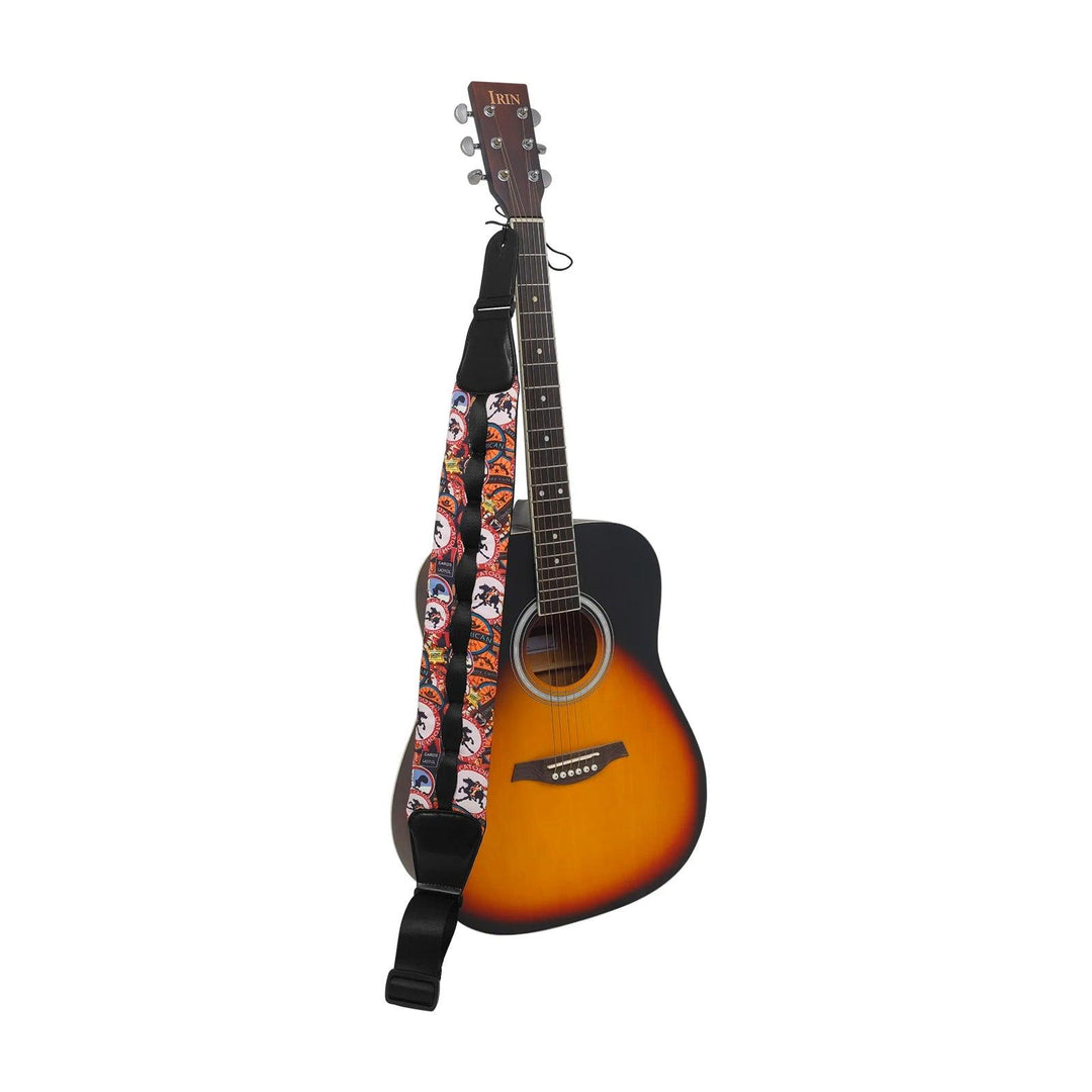 A six-string acoustic guitar with a sunburst finish is hanging from the Guitar Shoulder Strap Universal Guitar Belt Guitar Accessories, which features vibrant, abstract designs and a dark fretboard.