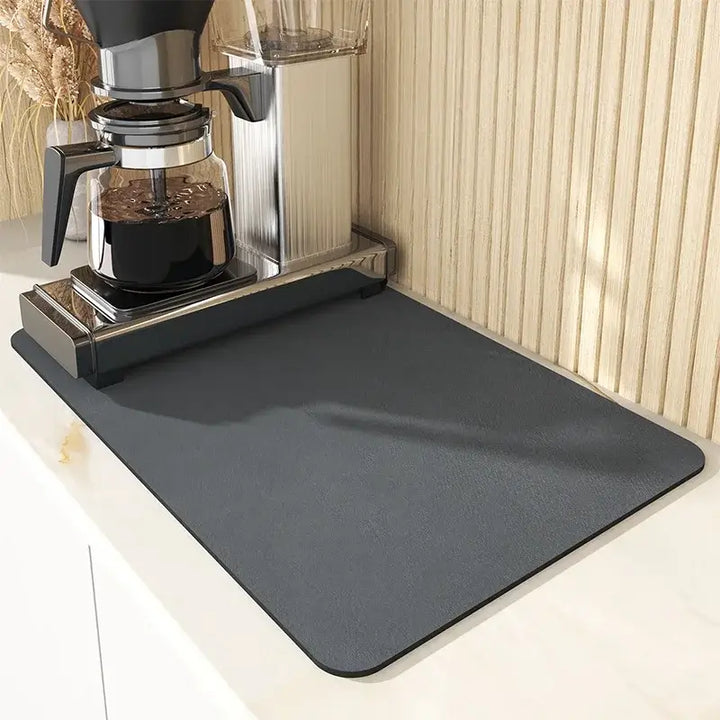 Kitchen mat for quick drying, antiskid, diatom mud, eco-friendly, rectangle, used under coffee maker on counter.