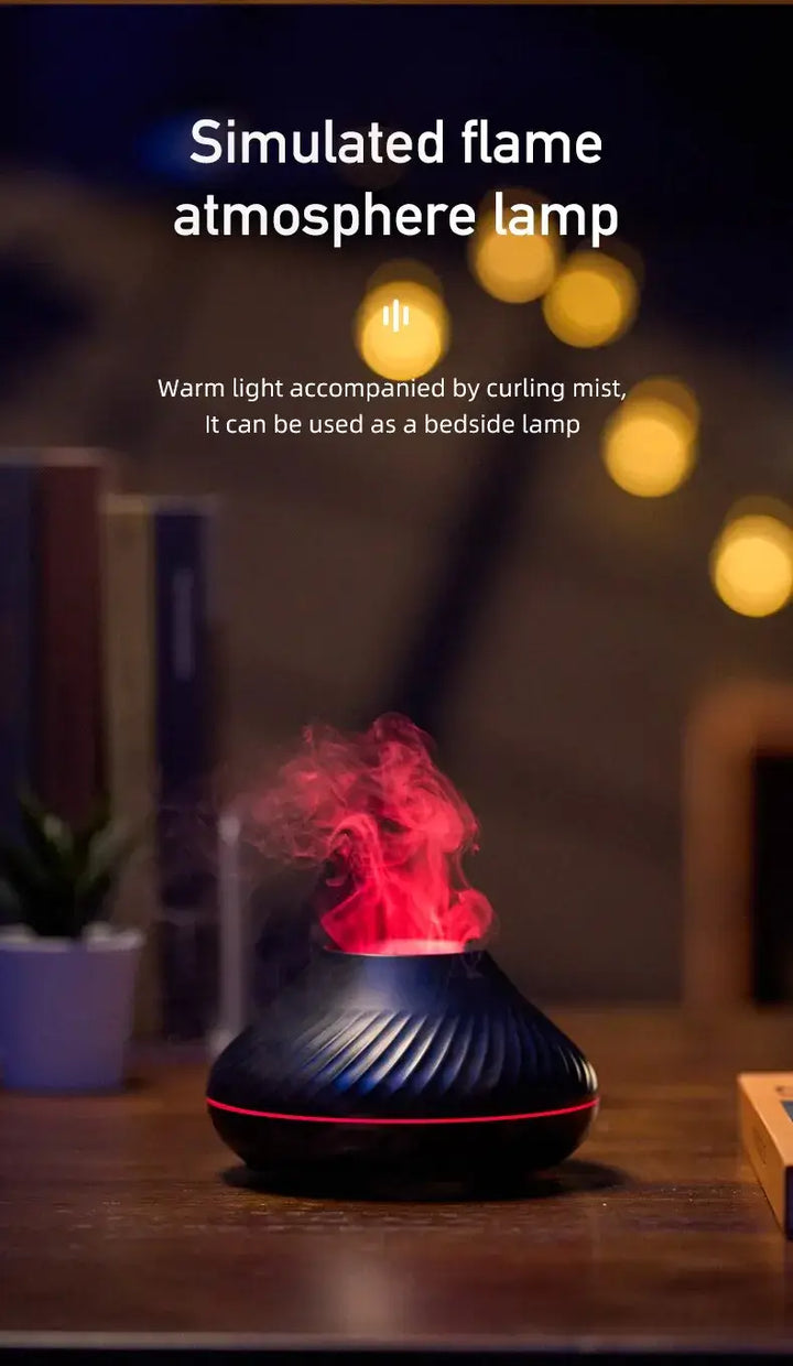 Simulated flame atmosphere lamp with warm light and curling mist on a desk for a cozy ambience.