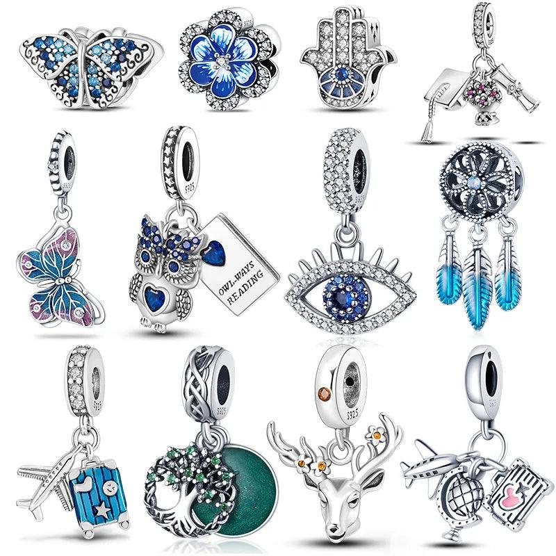 Explore a collection of Pandora Compatible Charms, crafted from 925 sterling silver and perfect for DIY jewelry making. With designs including a butterfly, hamsa hand, and airplane, each charm is embellished with blue and clear crystals. Ideal for Pandora 925 bracelets, these pieces provide endless creativity and style.