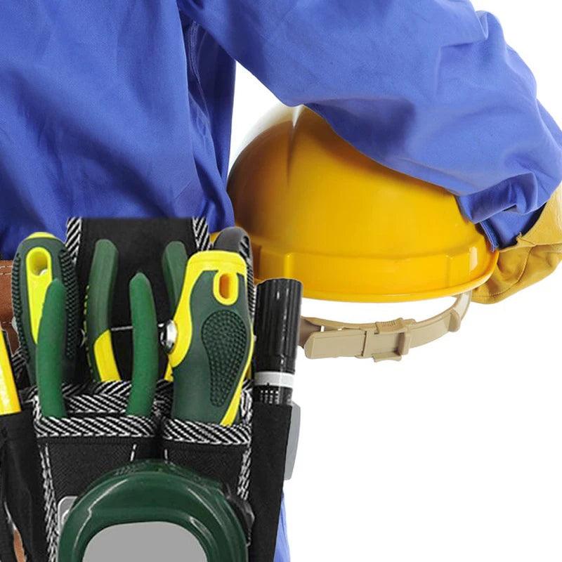 A person in a blue work uniform holds a yellow hard hat under their arm. The Multifunctional Tool Bag Electrician Waist Pocket Portable Tool Pouch, organized with tools like pliers and screwdrivers, is prominently visible in the foreground.