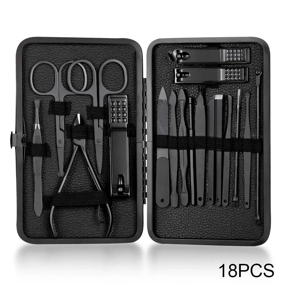 A black leather case houses the Nail Clipper Set Stainless Steel Manicure Kit with 18 portable pedicure tools, including scissors, nail clippers, tweezers, cuticle pushers, and ear picks—all meticulously organized for your grooming needs.