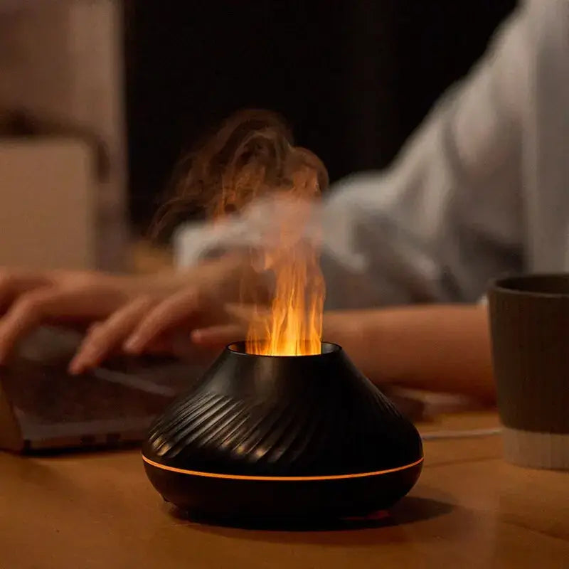 Flame Aromatherapy Humidifier with high fog output and quiet operation on a desk in a Nordic design setting.