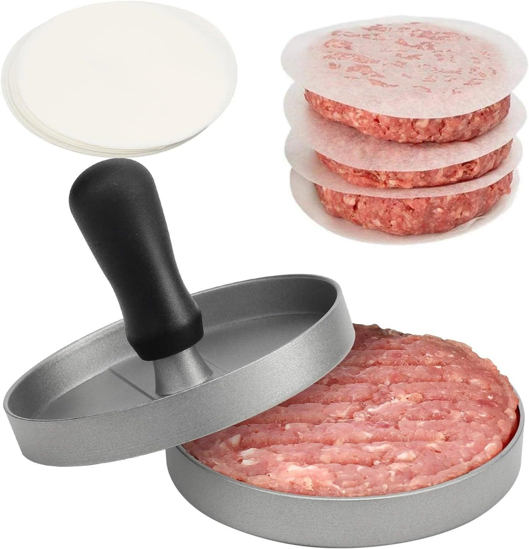 Introducing the Hamburger Press, featuring a sleek black handle and crafted from food-grade aluminum for enhanced durability. This indispensable kitchen tool shapes ground meat into perfect patties, with each one separated by white wax paper. Its non-stick surface ensures effortless release and cleanup, making it an essential addition to your kitchen collection.