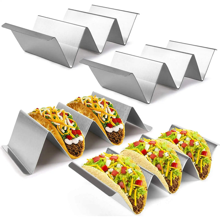 Set of 4 stainless steel taco holders with tacos, featuring V-shaped design for stability and easy serving.