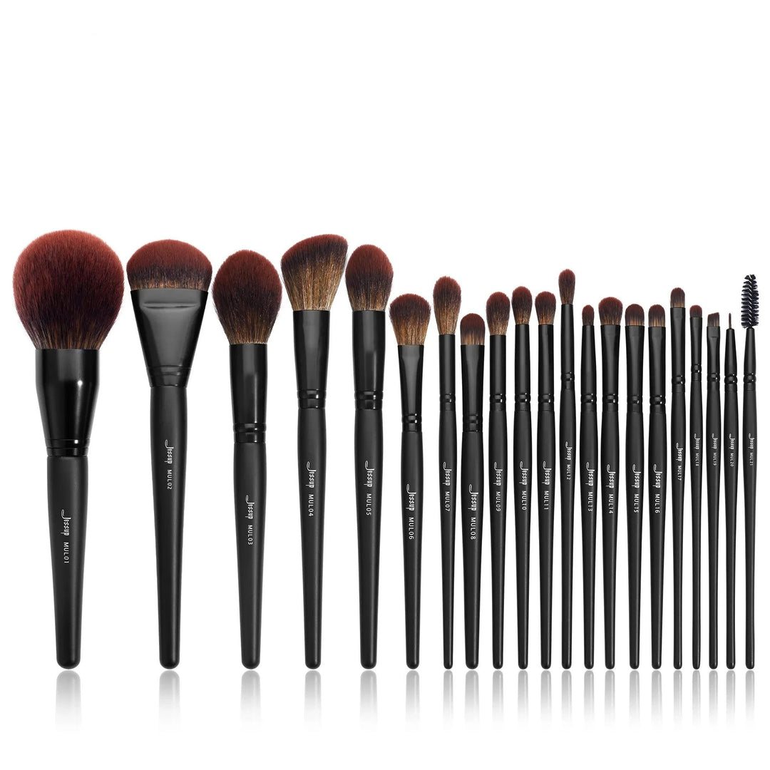 Introducing the Makeup Brushes Set, a professional collection featuring 20 expertly crafted black-handled brushes with synthetic hair. This set includes large fluffy powder brushes, angled brushes, and smaller eyeshadow and eyeliner brushes, all thoughtfully arranged from largest to smallest for your convenience.