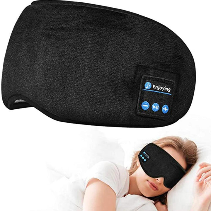 A black Bluetooth Sleep Headband with built-in headphones featuring active noise-cancellation technology. The close-up displays its control panel with buttons. Below, a person is shown lying in bed wearing the headband, appearing relaxed or asleep.