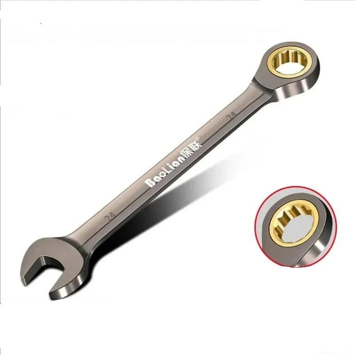 Introducing the Universal Torx Wrench: an elegant silver hybrid tool made of chromium-vanadium steel. It boasts a sophisticated design with a gold-ringed closed socket and an open-ended feature. A circular inset draws attention to the intricate details of the socket, while the handle's fine print underscores its durability and precision, making it perfect for versatile repairs.