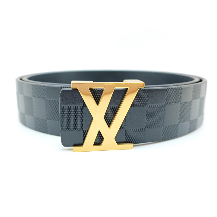 The "Fashion Belt for Men Stainless Steel Belt Buckle Designer Cow Belt" is made from premium leather and showcases a textured checkered pattern, along with a shiny gold buckle shaped like the letter "X," all displayed on a white surface.