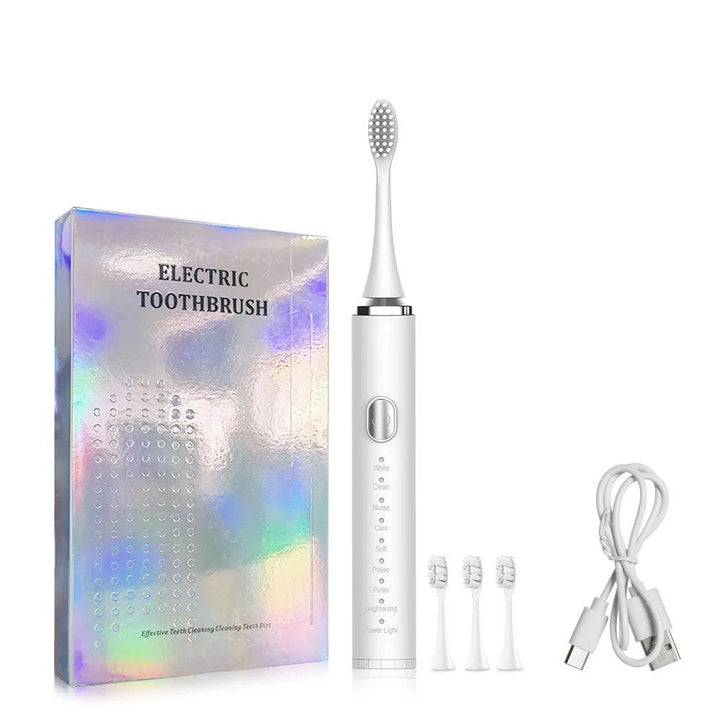 This stylish Sonic Vibration Electric Toothbrush set in white showcases advanced technology, featuring a rechargeable toothbrush body, three replacement brush heads, a charging cord, and a holographic box labeled "Sonic Vibration Electric Toothbrush.