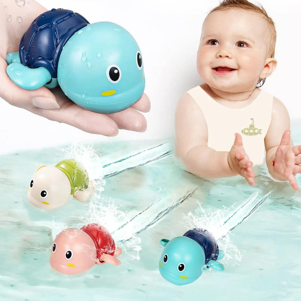 During bath time play, a smiling baby happily claps in the tub as colorful Swimming Turtle Toys paddle around. One of these Baby Bath Toys is held up to the camera, highlighting its child-safe plastic, cheerful face, and blue shell.