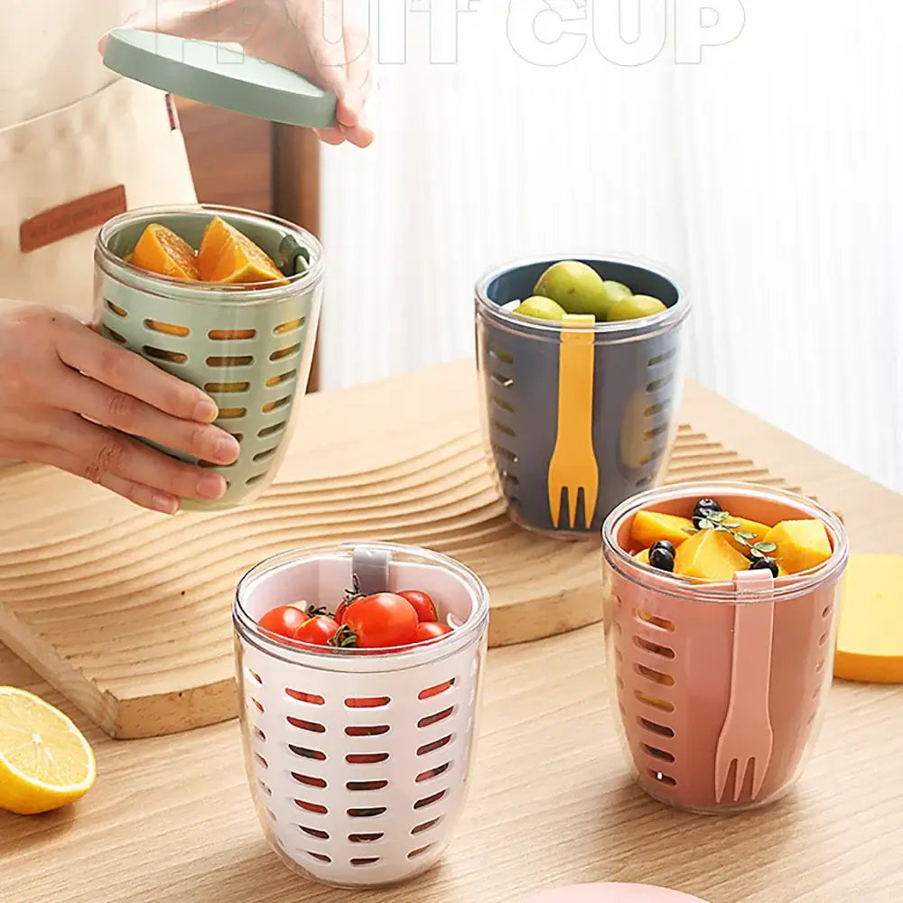 A person using the "Fruit Cup with Fork Portable Picnic Bottle Large Capacity Storage Plastic Cup Sealed Leak Proof" ensures spill-free storage of their fresh produce.