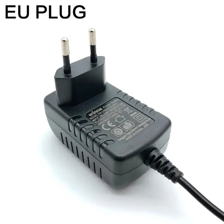 Electric adapter with EU plug, suitable for various electronics. Compact design for easy use and storage.